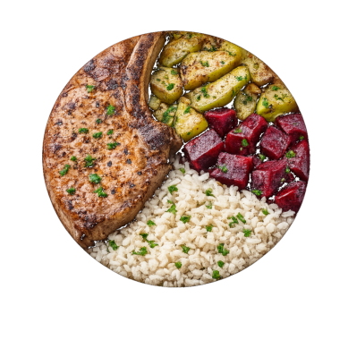 Chuleta de cerdo con verduras al horno